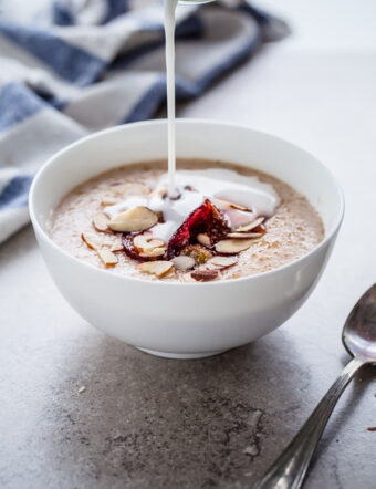 Broken Farro Porridge with Coconut Milk, Almonds, & Roasted Plums