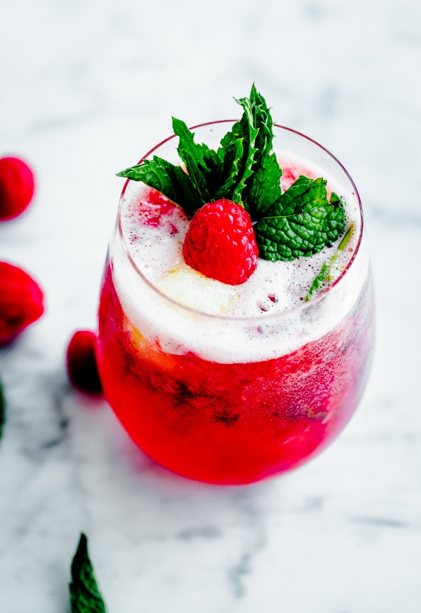 Sorbet Prosecco Floats with Muddled Raspberries and Fresh Mint A