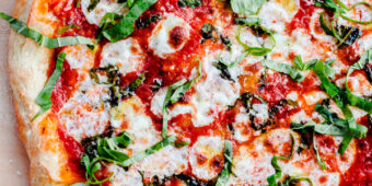 The BEST Homemade Margherita Pizza. Made in a standard kitchen oven!