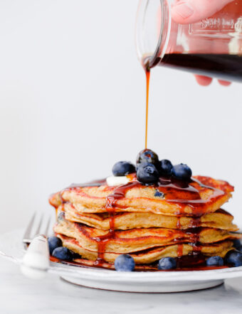 Blueberry Rye Pancakes with 2-Ingredient Molasses Syrup. Fluffy 100% whole grain pancakes filled with fresh blueberries!