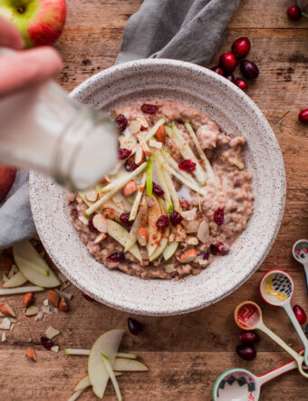 Slow Cooker Steel Cut Oats with Apple and Cranberries. A delicious, healthy crockpot breakfast that is ready for you when you wake up!