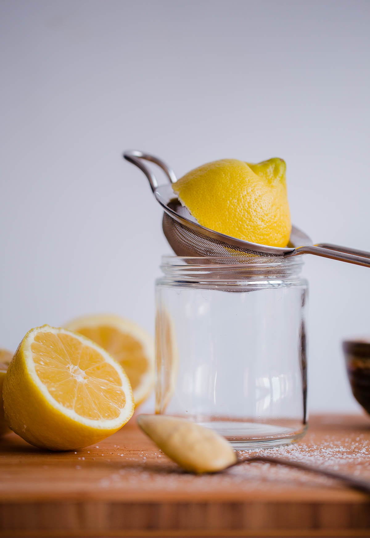 Lemon Juice Being Squeezed into a jar